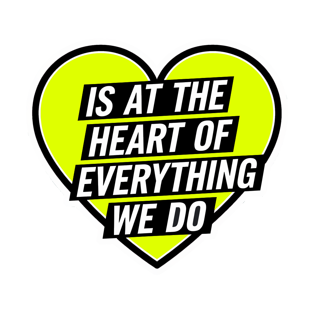 Yellow heart badge reading "is at the heart of everything we do"