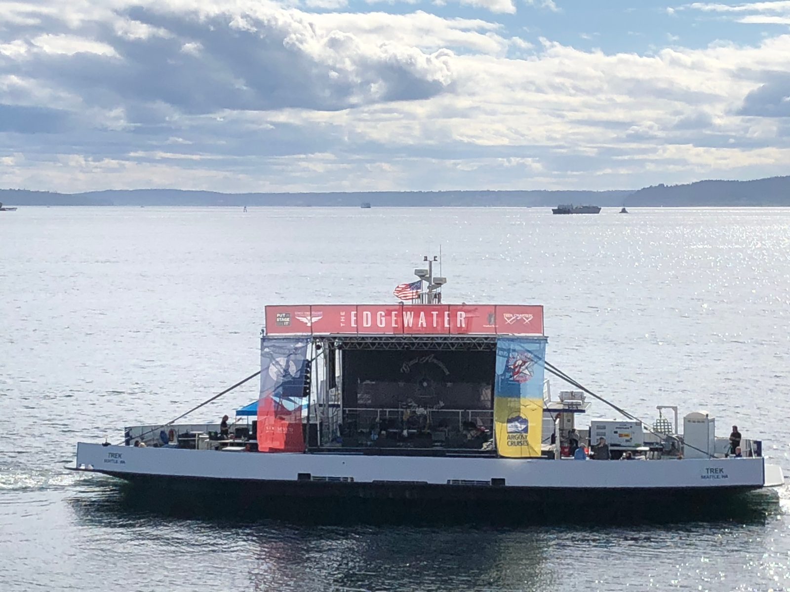 Mobile stage rigged on a barge on Puget Sound